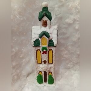 Festive Holiday Village House with Green Accents